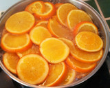 Foto del paso 3 de la receta: Naranjas confitadas con chocolate 🍫🍊