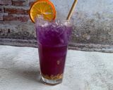 A picture of step 4 of Magic butterfly Mocktail.
