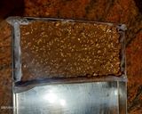 A picture of step 3 of Peanut Chocolate Chikki.