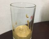 A picture of step 5 of Hand beaten cappuccino coffee.