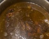 A picture of step 5 of Fesenjan (Persian Pomegranate Walnut Stew) with Chicken Thighs and Crispy Tahdig Rice.