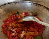 A picture of step 2 of Sev Tomato Sabji - Gujarati dinner sabji with butter roti.