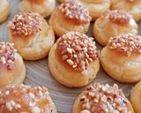 Foto del paso 8 de la receta: Miniprofiteroles rellenos de crema de limón con cobertura de toffee y crocanti