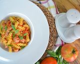 Foto del paso 2 de la receta Hélices con salchichas y tomate