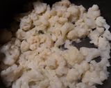 A picture of step 3 of Hominy and Cauliflower in a Cheesey Sauce.