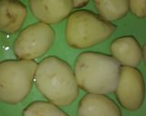 A picture of step 1 of Kashmiri dum aloo.