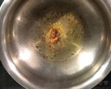 A picture of step 1 of Mooli-Aloo-Matar.