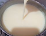 A picture of step 4 of Milky vanilla curd with Orange jelly.