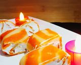 A picture of step 16 of Orange Marble Swiss Roll.