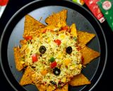 A picture of step 8 of Cheesy loaded vegetable Nachos.
