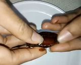 A picture of step 2 of Almond stuffed dates chocolate.