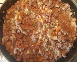 A picture of step 3 of Stuffed Bell Peppers with Ground Meat (Picadillo) and Cheese.