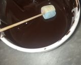 A picture of step 3 of 1 bite chocolatey marshmallow pops.