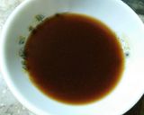 A picture of step 5 of Spicy wings with sauce.