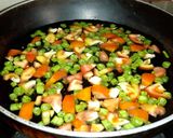 A picture of step 1 of Beans Tomato Egg drop soup.