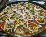 صورة لخطوة 6 من وصفة بيتزا الطعم خيالي 😋😋