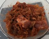 A picture of step 3 of Korean kimchi pork rib stew.