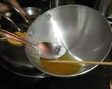 A picture of step 4 of Dalgona Lollipops /Korean Dalgona Candy.