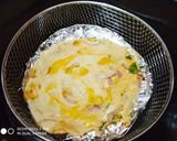 A picture of step 3 of Afgani Fateer Pyazi with Curd.
