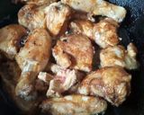 A picture of step 2 of Chicken 65 with sauce/Gravy.