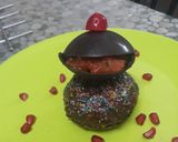 A picture of step 9 of Chocolate Disc on chocolate cup cake.