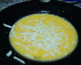 Foto del paso 4 de la receta: Sándwich de revuelto de puerro y queso parmesano