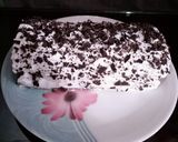 A picture of step 12 of Chocolate swiss roll.