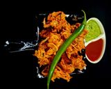 A picture of step 5 of Onion Pakoda.