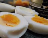 A picture of step 1 of Deviled Eggs with Manchego Cheese Spread and Avocado.