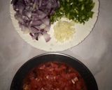 A picture of step 3 of Ugali,Omena and Greens,Served with an Orange fruit.