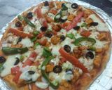 A picture of step 5 of Smoked chicken tikka flavour pizza 🍕🍕🍕🍕😋😋😋😋.
