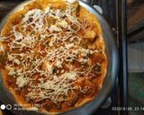A picture of step 4 of Cheese burst pizza.