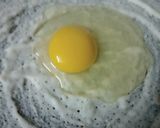 A picture of step 5 of Dosa(onion, tomato and egg).