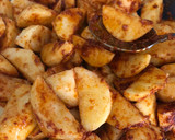 Foto del paso 2 de la receta: Papas gajo al horno, especiadas