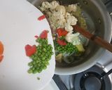 A picture of step 3 of Potatoes, Cauliflower & Peas.