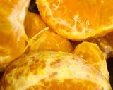 A picture of step 1 of Refreshing orange kiwi mocktail.