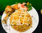 Hình bước làm 4 của món Cơm rang kim chi + đùi gà chiên 🍚🍗