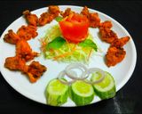 A picture of step 9 of Achari chicken tikka.