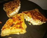 A picture of step 13 of Roti ke double layer tringle shape pizza.