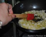 A picture of step 2 of Persian turmeric rice (Dampokhtak).