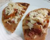 A picture of step 6 of Loaded chapati 'tacos'.