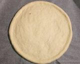A picture of step 7 of Chicken tikka pizza without oven.