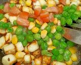 A picture of step 4 of Paneer Corn Tawa Pulao.