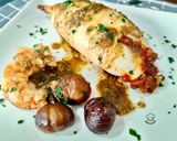 Foto del paso 8 de la receta Calamar relleno de gambón y castañas con reducción al brandy