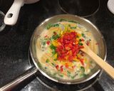 A picture of step 6 of Cajun grilled shrimp with loaded veggie Alfredo noodles.