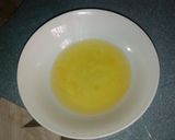 A picture of step 1 of Orange chicken.