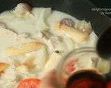 A picture of step 10 of Tom Kha Gai with King Oyster Mushrooms.