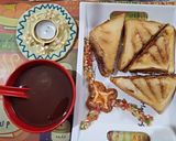 A picture of step 4 of Schezwan Veg grilled sandwich.