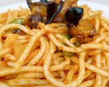 A picture of step 7 of Fried Baby Snails On Mixed Veggies Jollof Pasta.
