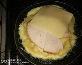 Foto del paso 6 de la receta: Tortilla de papas rellenas de queso y jamón
